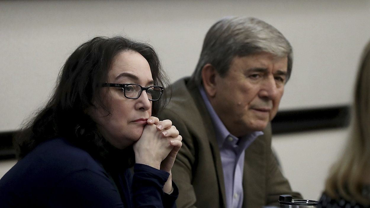 Rose Marie Kosmetatos, left, and her husband, Antonios Pagourtzis, parents of accused Santa Fe High School shooter Dimitrios Pagourtzis, listen to their attorneys discuss a motion Friday, Aug. 16, 2024, during their civil trial in Galveston County Court No. 3 Judge Jack Ewing's courtroom at the Galveston County Courthouse in Galveston, Texas.  (Jennifer Reynolds/The Galveston County Daily News via AP, Pool)