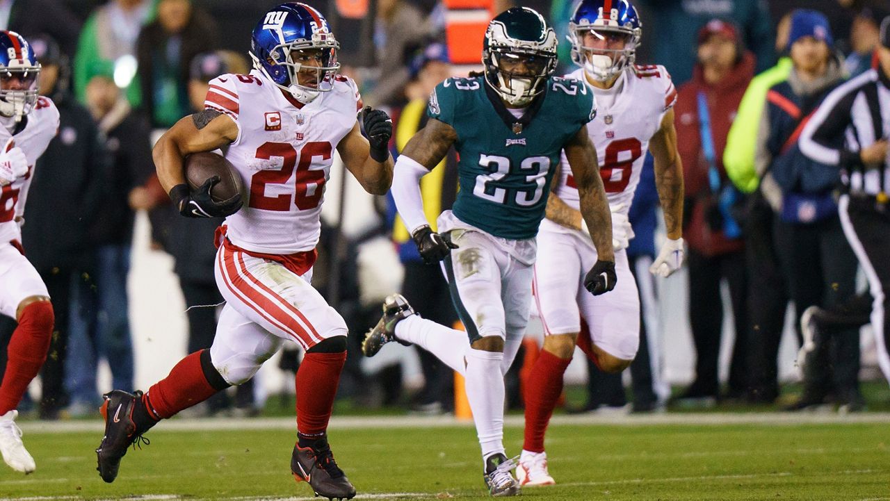 Saquon Barkley runs with the ball during a game against the Philadelphia Eagles on Saturday, Jan. 21, 2023 in Philadelphia.
