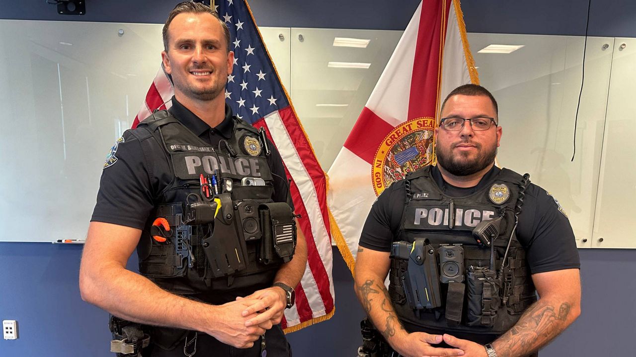 Sarasota officers recount pulling man from ledge