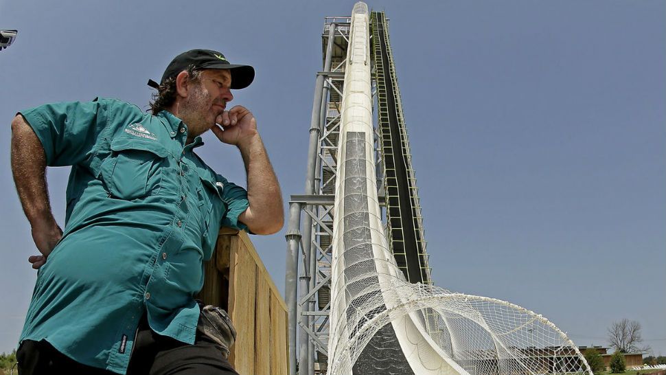 FILE - In this July 9, 2014, file photo, Schlitterbahn co-owner Jeffery Henry looks over his creation, the world's tallest waterslide called "Verruckt" at Schlitterbahn Waterpark in Kansas City, Kan. The Kansas City Star reports that Schlitterbahn Waterparks and Resorts co-owner Henry was arrested Monday, March 26, 2018, in Cameron County, Texas. (AP Photo/Charlie Riedel, File)