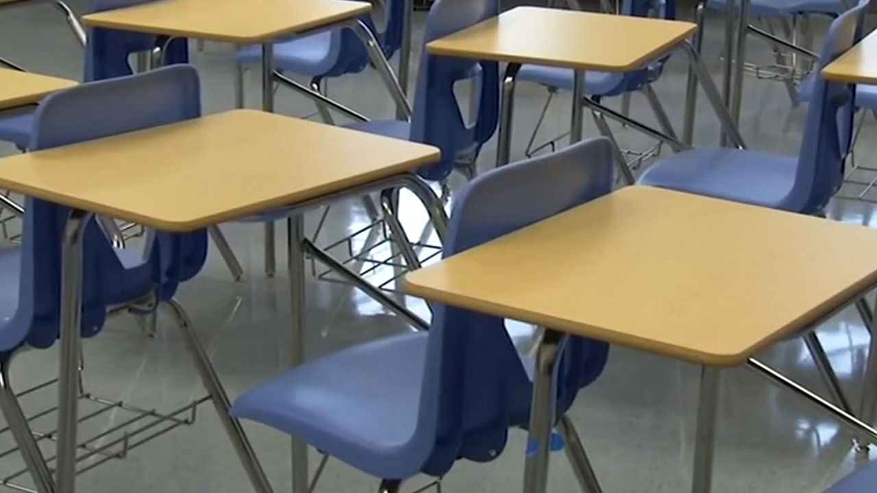 School desks in a classroom (Courtesy)