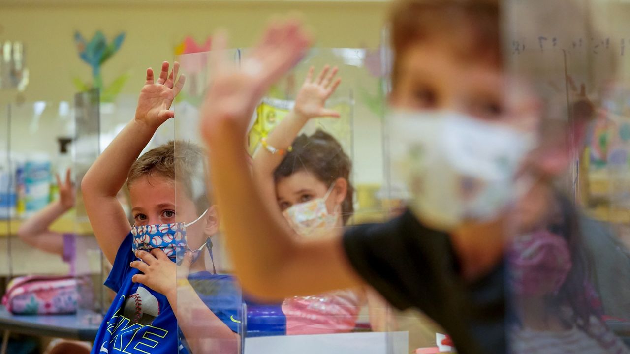 Masked children in school (file)