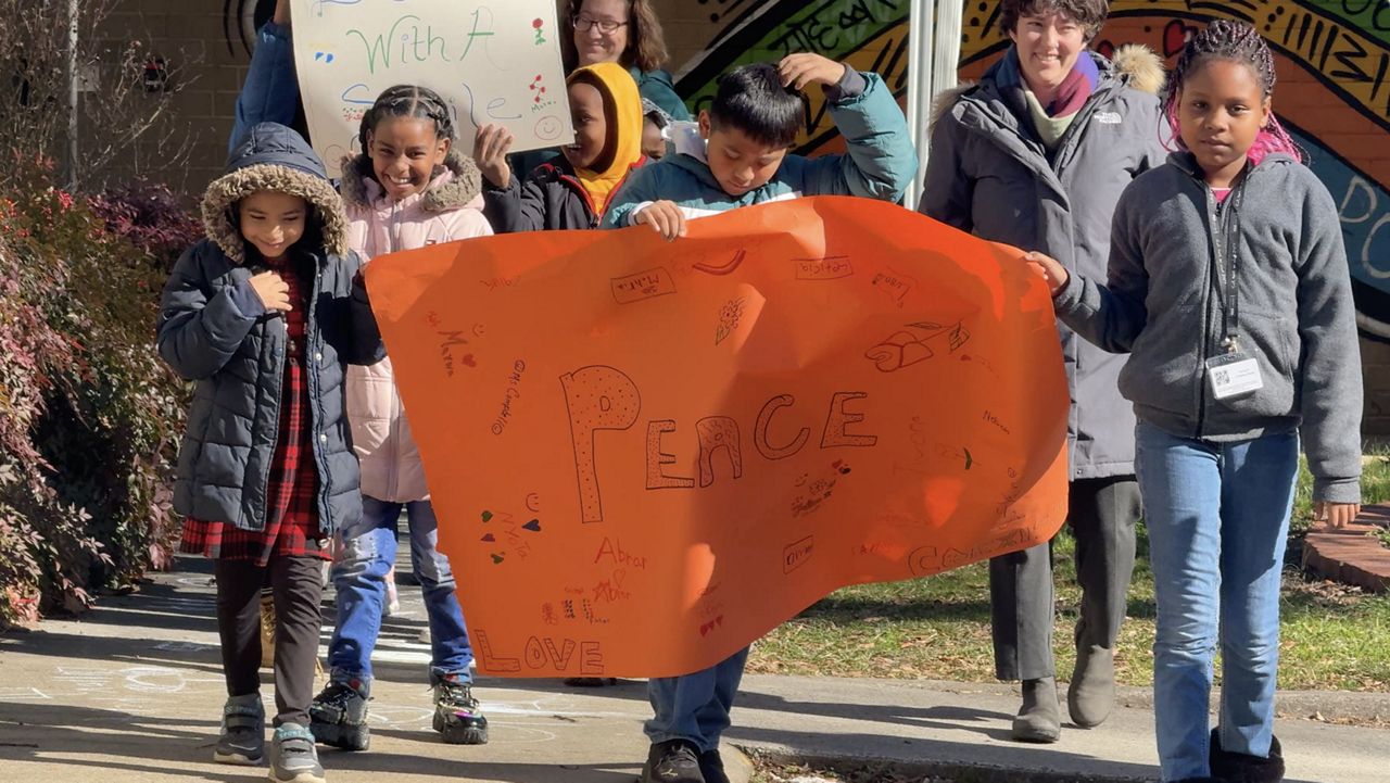 School in Greensboro hosts 'Walk for Peace' inspired by Buddhist monks’ cross-country journey