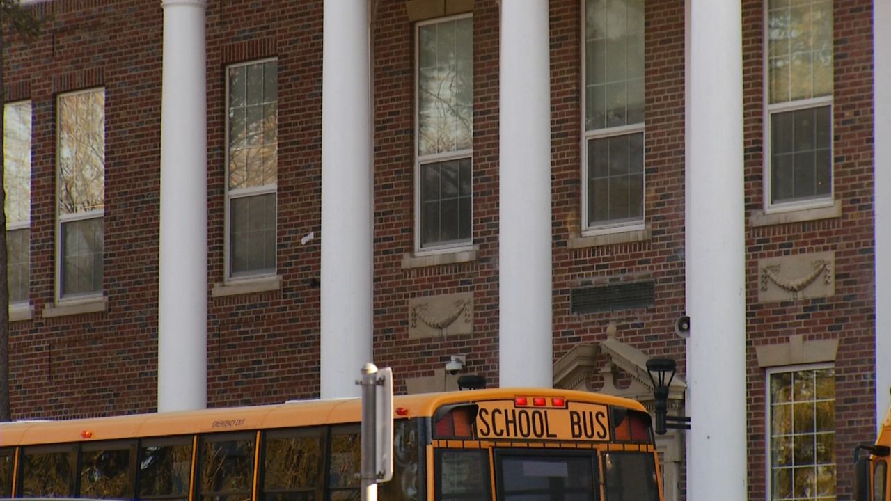 school bus parked outside school