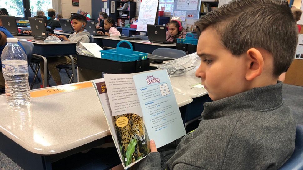 A Palm View School student reads quietly. (Angie Angers/Spectrum Bay News 9) 
