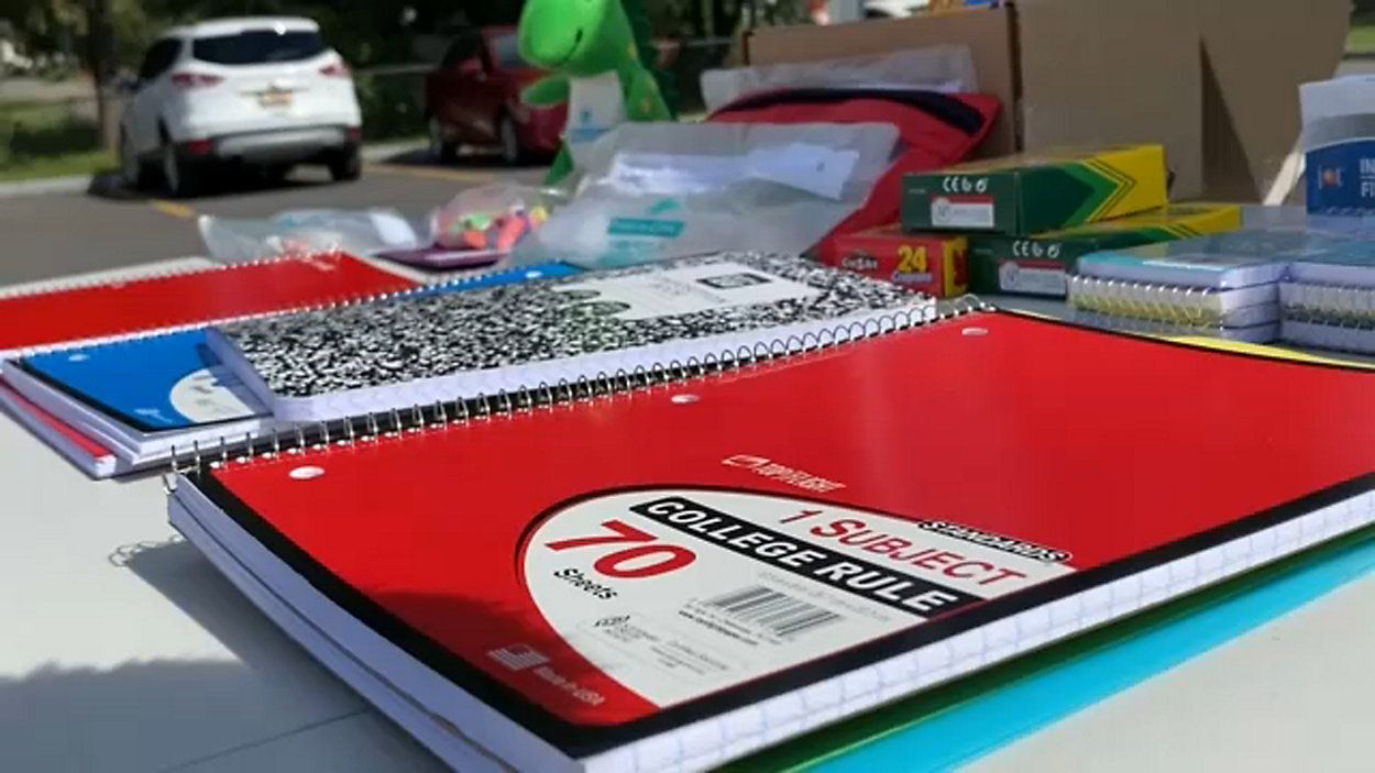 School supplies, such as notebooks, colored pencils, crayons and composition books. (File)