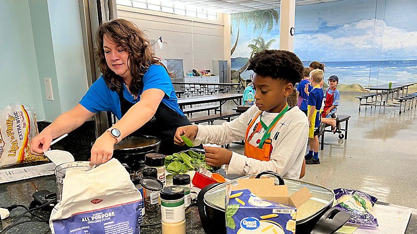 Fit Kids Health's Brigette Schupay hosts a cooking class at Channelside Christian School in St. Pete this past summer. (Spectrum News)