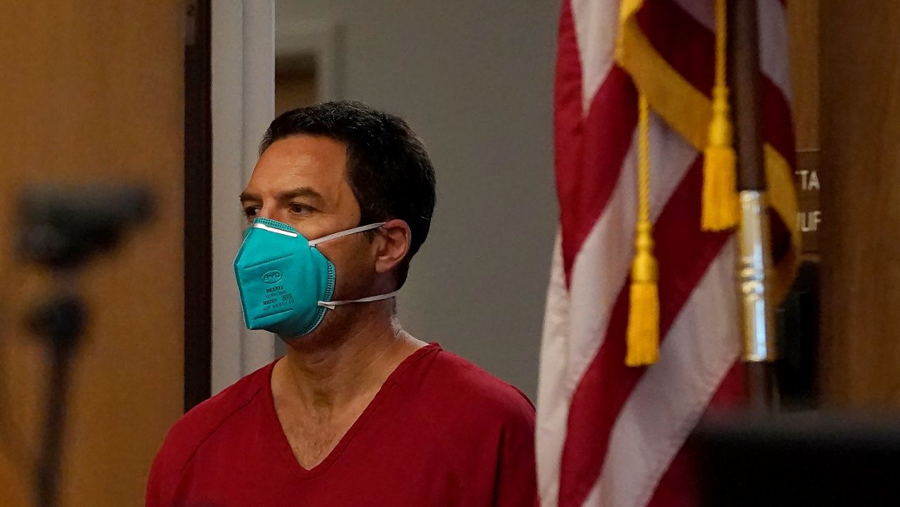 Scott Peterson walks into a courtroom at the San Mateo County Superior Court in Redwood City, Calif., Thursday, Aug. 11, 2022. (AP Photo/Jeff Chiu, Pool)