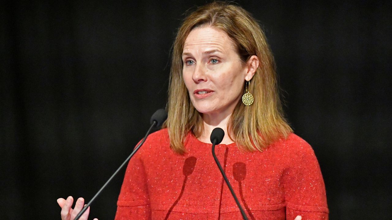 U.S. Supreme Court Associate Justice Amy Coney Barrett speaks to an audience at the 30th anniversary of the University of Louisville McConnell Center in Louisville, Ky., Sunday, Sept. 12, 2021. (AP Photo/Timothy D. Easley)