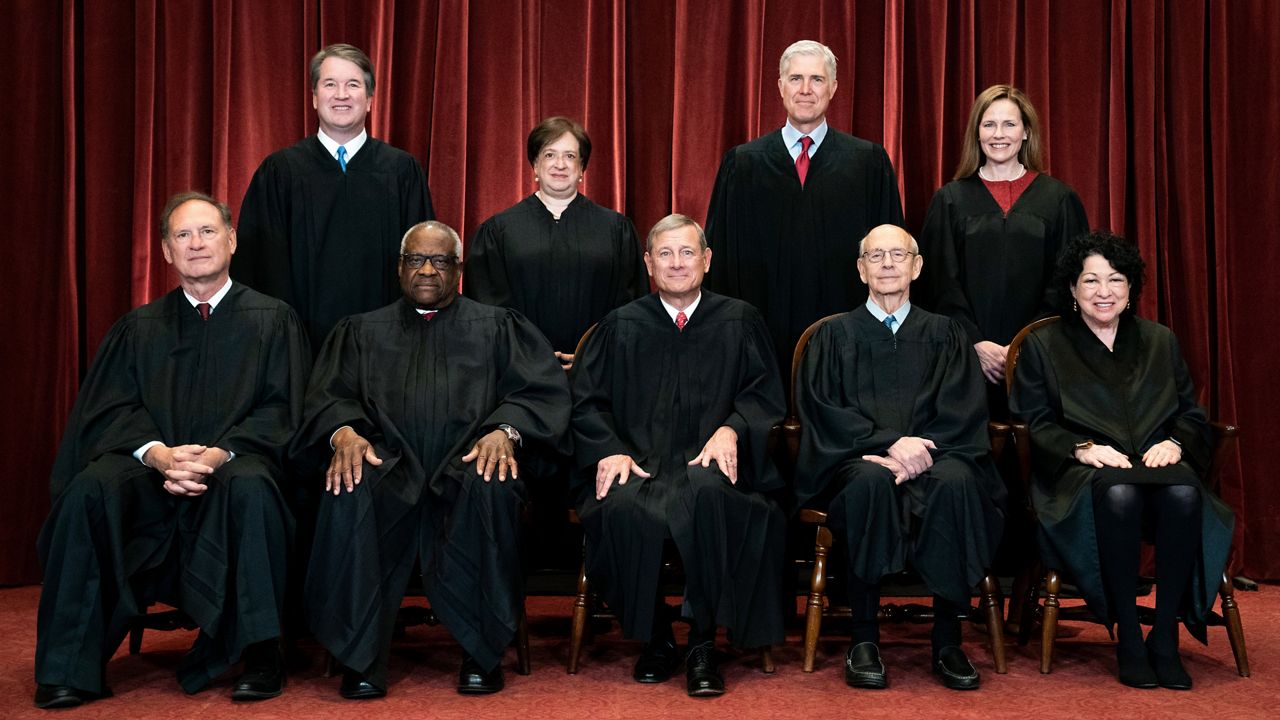 Members of the Supreme Court pose for a group photo at the Supreme Court in Washington, April 23, 2021. Seated from left are Associate Justice Samuel Alito, Associate Justice Clarence Thomas, Chief Justice John Roberts, Associate Justice Stephen Breyer and Associate Justice Sonia Sotomayor, Standing from left are Associate Justice Brett Kavanaugh, Associate Justice Elena Kagan, Associate Justice Neil Gorsuch and Associate Justice Amy Coney Barrett.