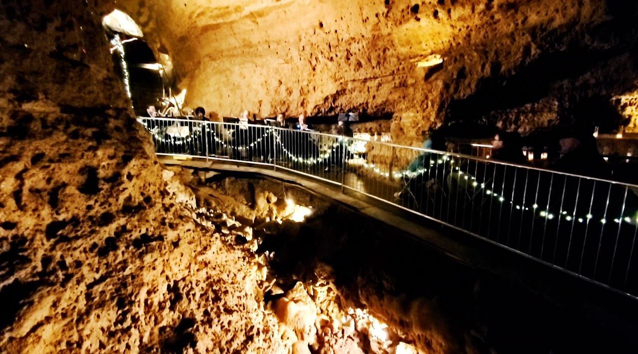 Musicians make  the cave experience magical with Christmas songs.