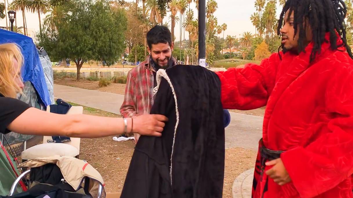 Fashion Designer Harvey Justice Gives Robes Away to Homeless