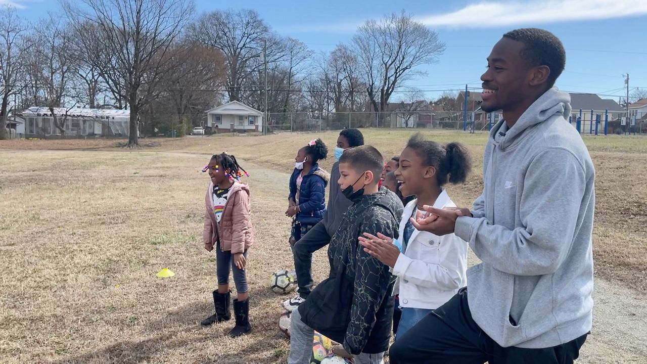 Local athlete helps teach children sports