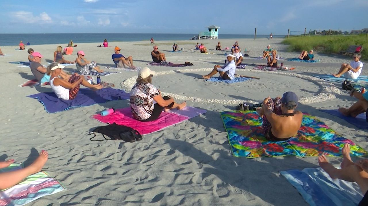 Practice yoga on Venice Beach