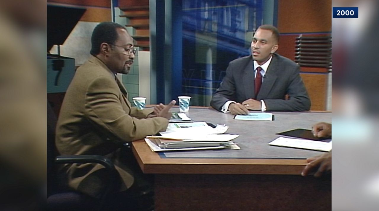 Hakeem Jeffries (right) appears in a 2000 debate on NY1 during his first, unsuccessful campaign to unseat Brooklyn Assemblymember Roger Green (left). (NY1 Photo)