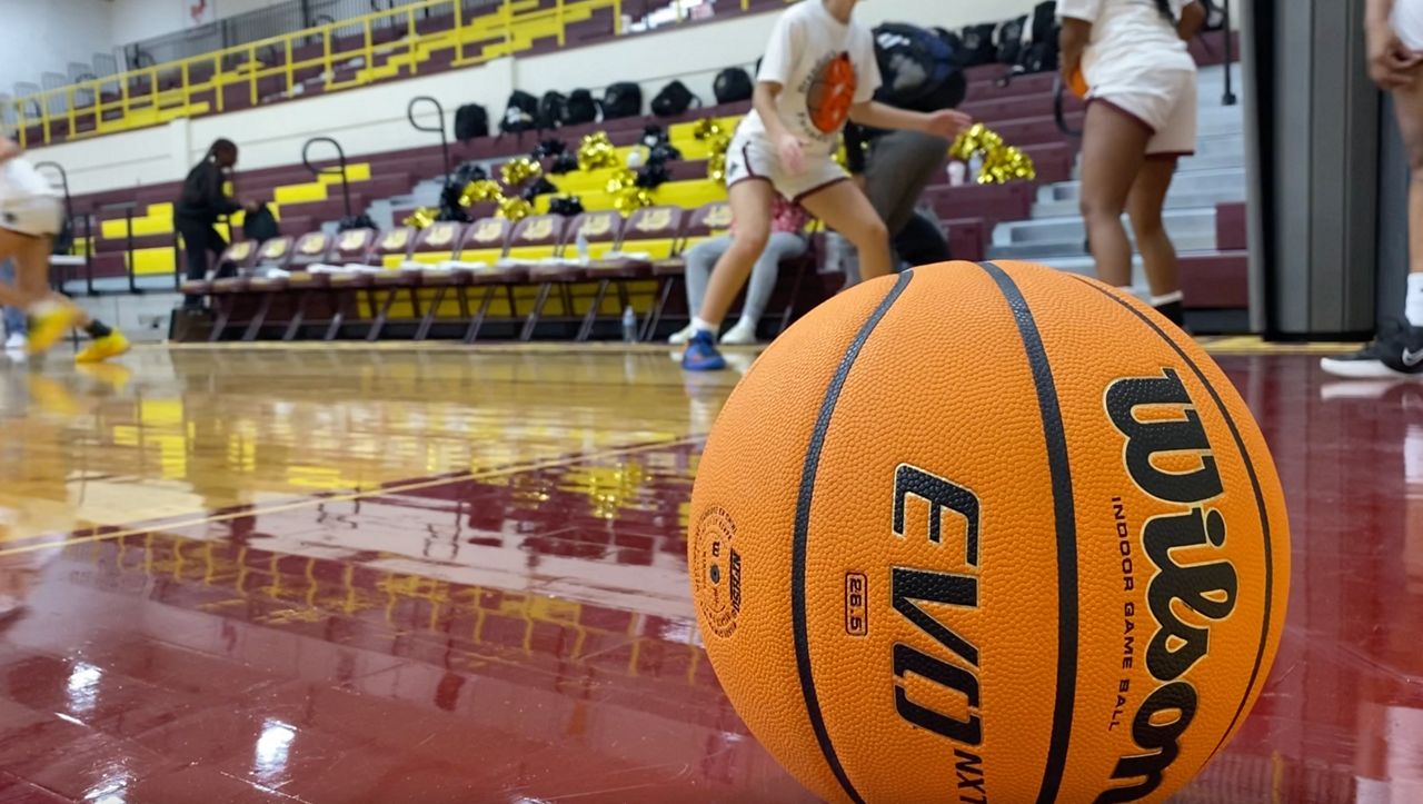 Lumberton High School girls' basketball warming up for their white-out game
