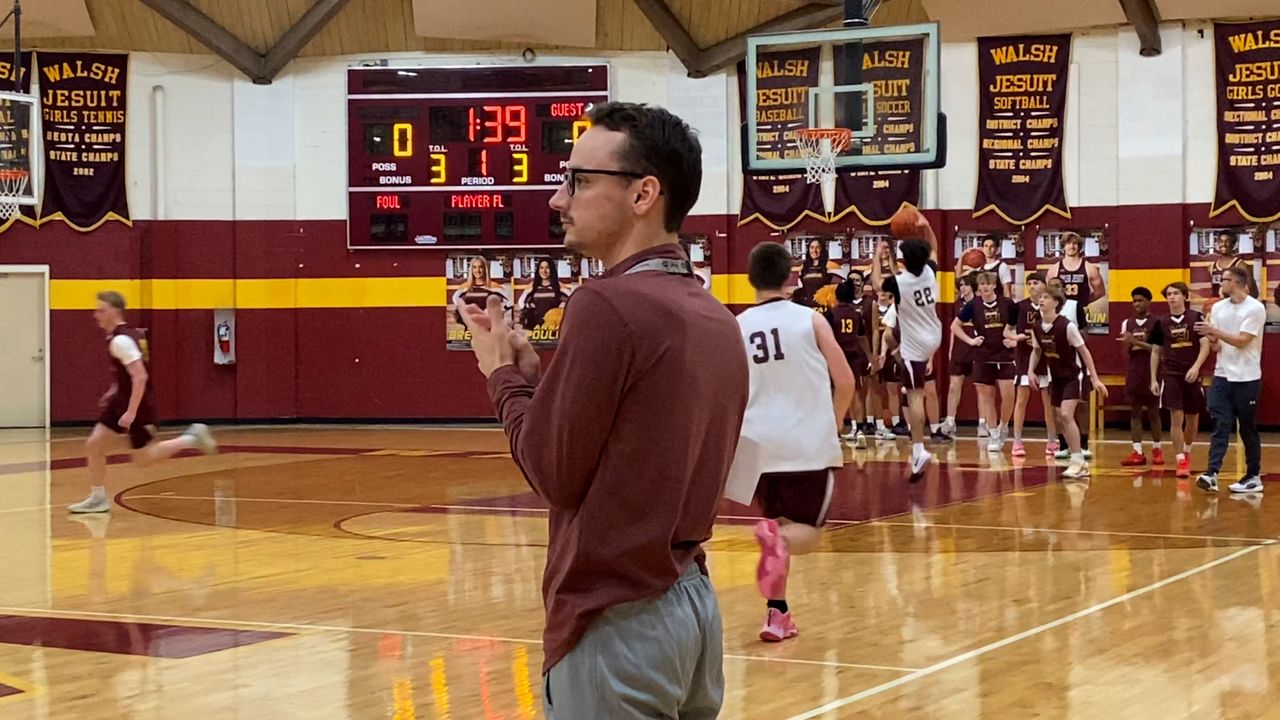 Walsh Jesuit basketball coach follows in his dad’s footsteps