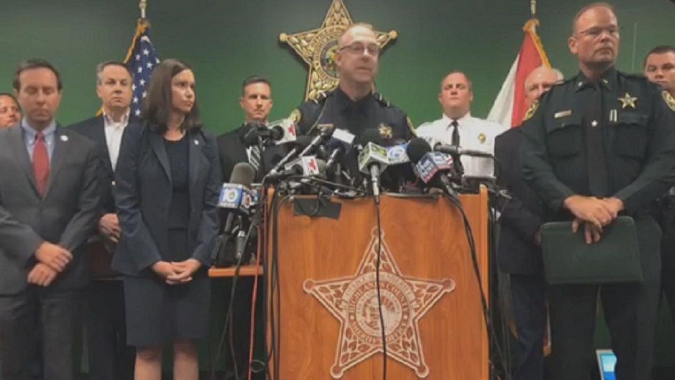 Sebring Police Chief Karl Hoglund (at podium) and others addressed the media Thursday morning. (Spectrum News)