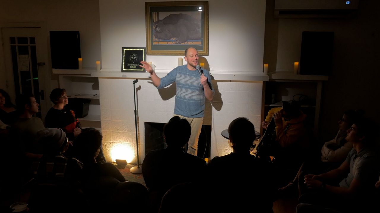 David Horning, the co-founder of Secret Society Comedy, doing a show. 