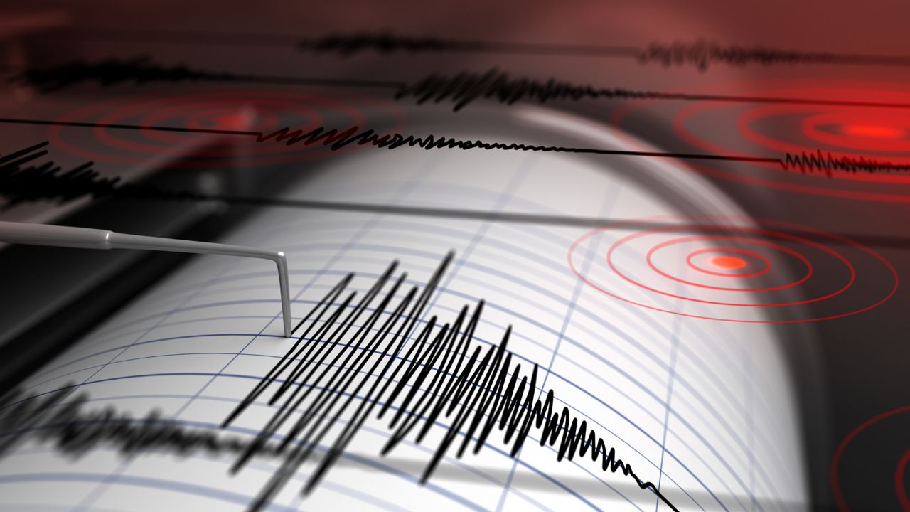 Seismograph with paper in action and earthquake. (Getty Images)