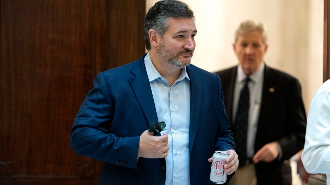 Sen. Ted Cruz, R-Texas, followed by Sen. John Kennedy, R-La., leaves a policy luncheon, Thursday, Feb., 17, 2022, on Capitol Hill in Washington. (AP Photo/Jacquelyn Martin)