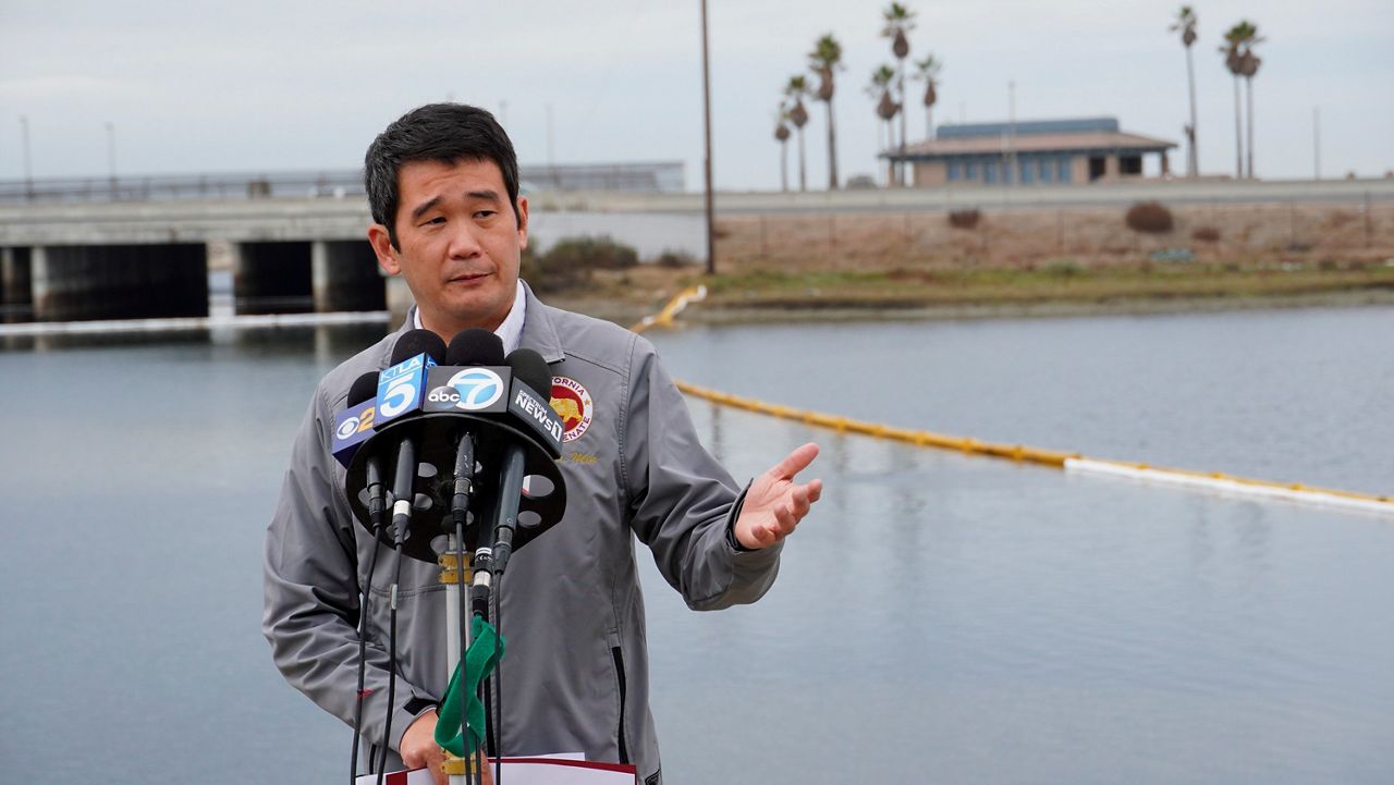 California state Sen. Dave Min speaks to reporters in Huntington Beach, California, on Oct. 6, 2021. Min was arrested for misdemeanor driving under the influence on Tuesday. Min, a Democrat, is a candidate for California’s 47th Congressional District. (AP Photo/Eugene Garcia)