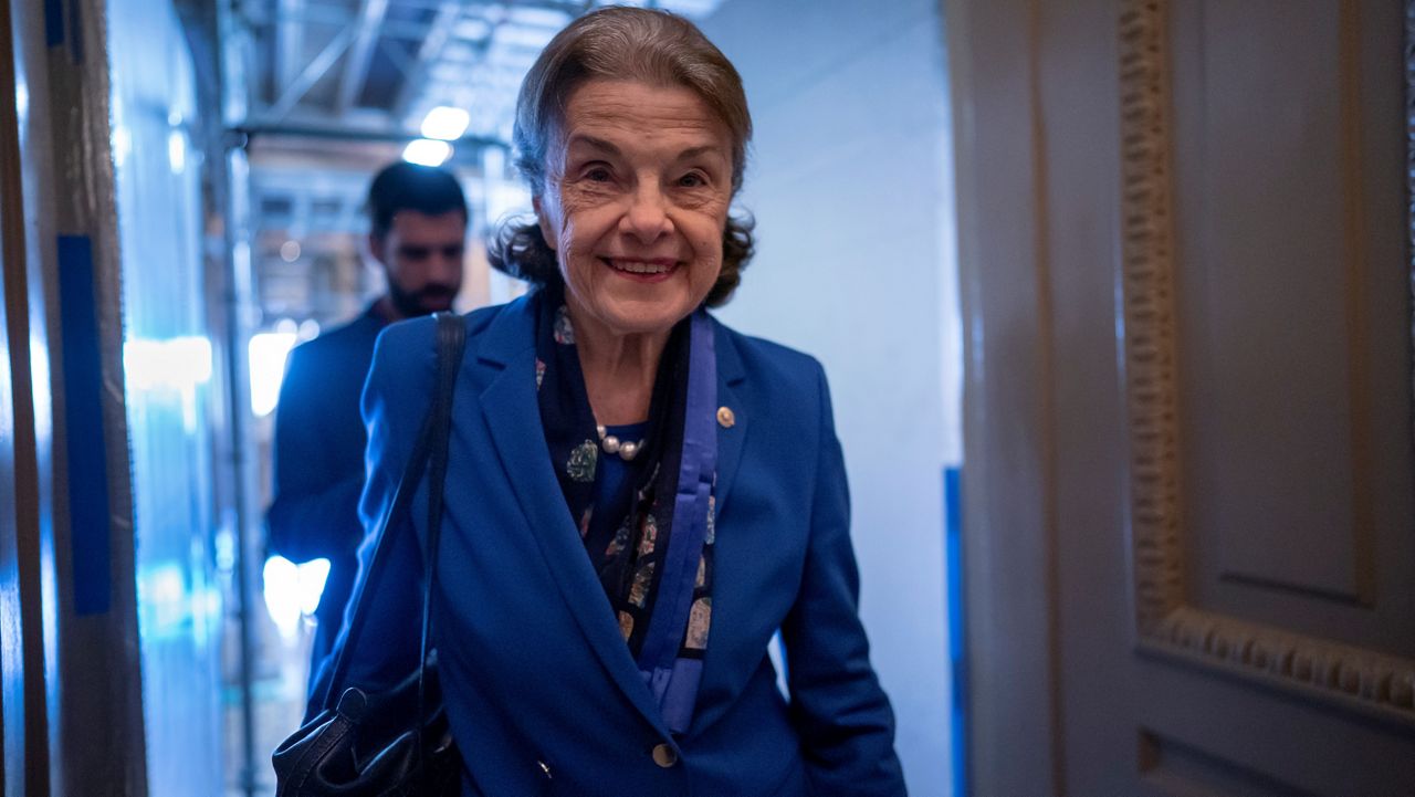 Sen. Dianne Feinstein, D-Calif., walks through a Senate corridor after telling her Democratic colleagues that she will not seek reelection in 2024, at the Capitol in Washington, Tuesday, Feb. 14, 2023. (AP Photo/J. Scott Applewhite)