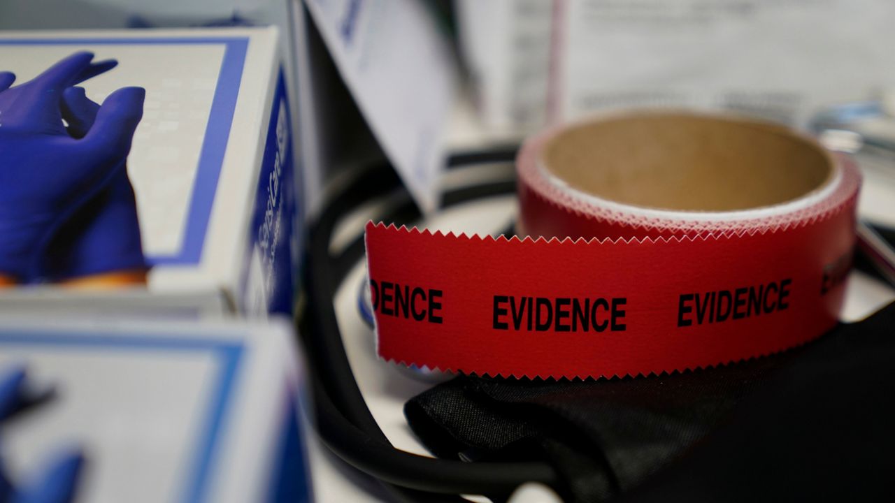 Evidence tape is seen with a Sexual Assault Evidence Collection Kit in an examination room, Wednesday, Aug. 31, 2022, in Austin, Texas. After a Texas law banning abortions past about six weeks, even in cases of rape or incest, went into effect a year ago, Gov. Greg Abbott said the state would strive to "eliminate all rapists from the streets." (AP Photo/Eric Gay)