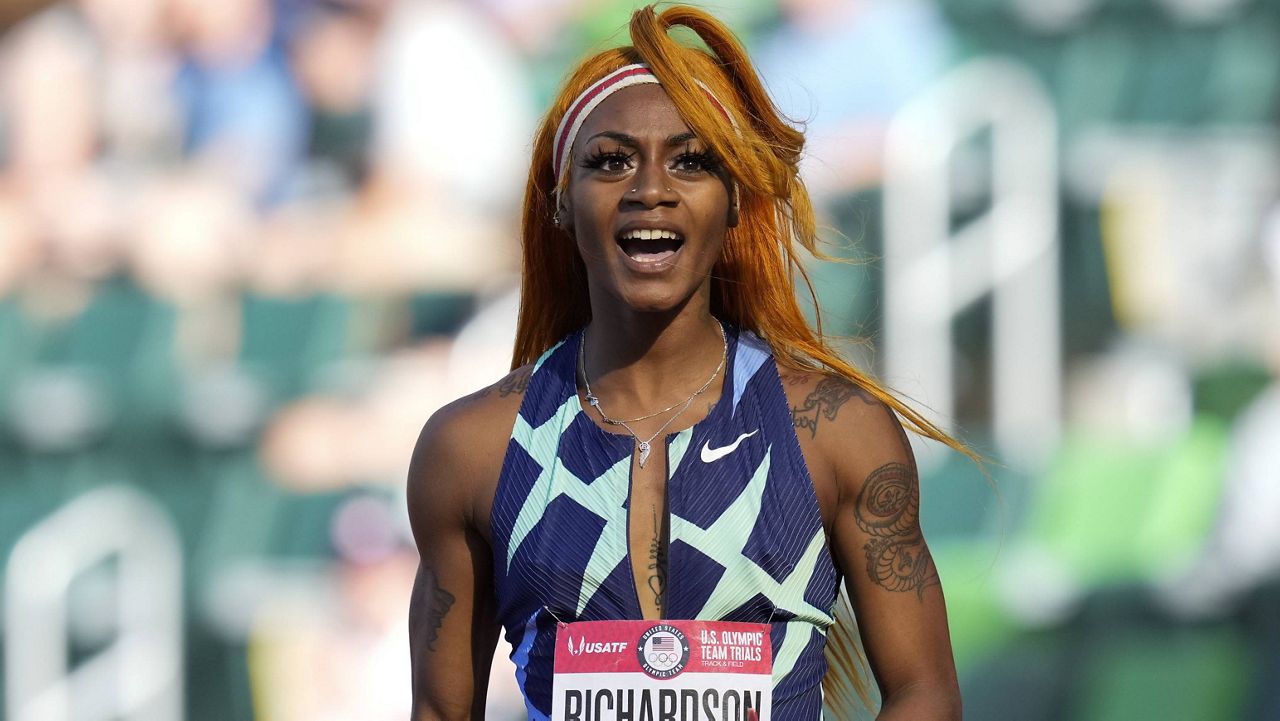 Sha'Carri Richardson celebrates after winning the first heat of the semifinals in women's 100-meter run at the U.S. Olympic Track and Field Trials on June 19. (AP Photo/Ashley Landis)