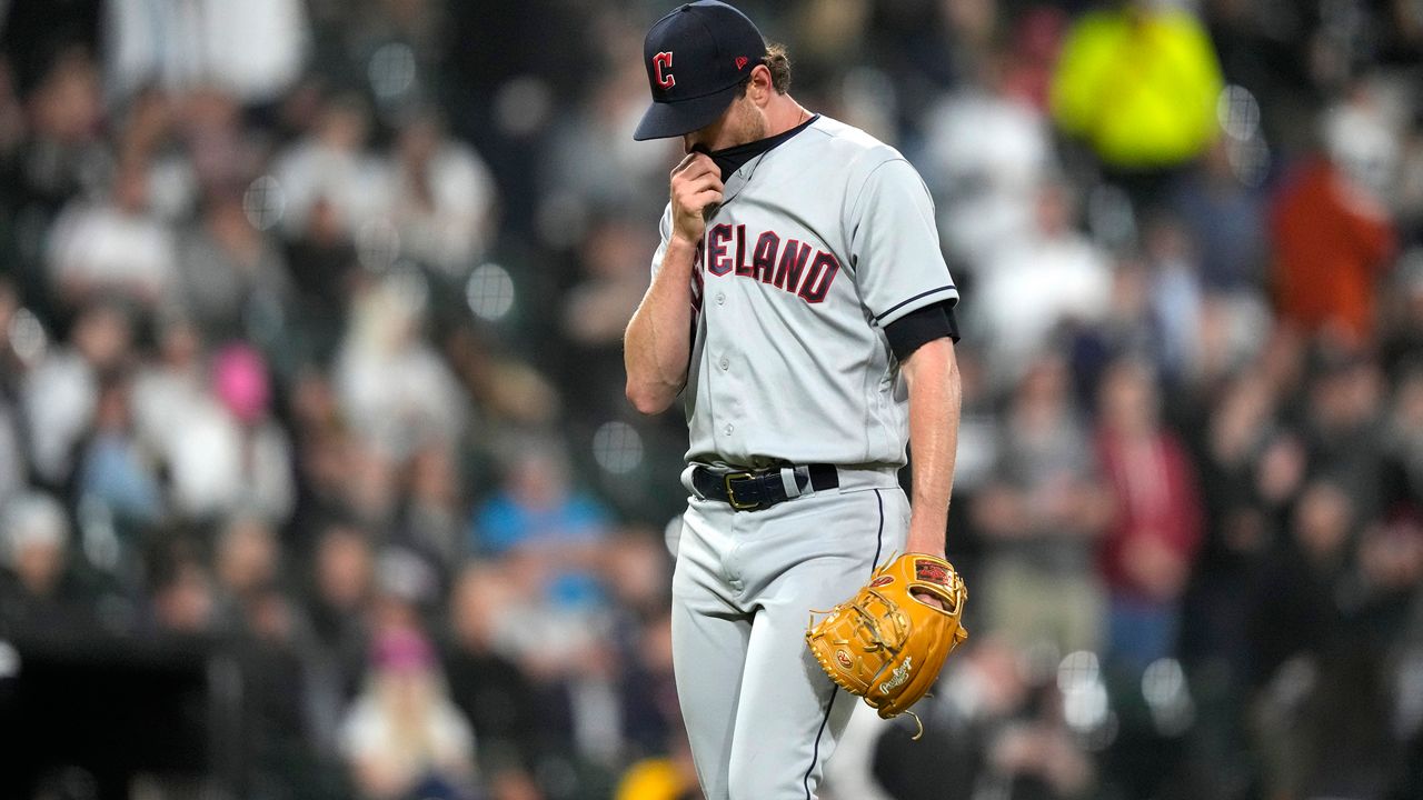 Cleveland Guardians starting pitcher Shane Bieber heads to the clubhouse after being pulled by manager Terry Francona during the fifth inning of the team's baseball game against the Chicago White Sox on Tuesday, May 16, 2023, in Chicago. (AP Photo/Charles Rex Arbogast)