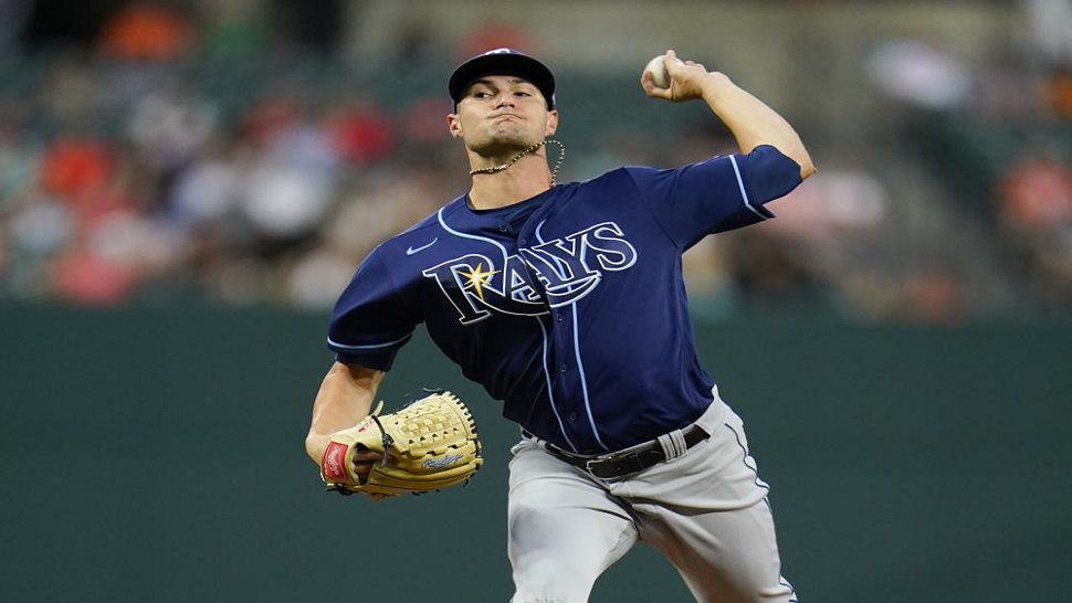 Tampa Bay Rays starting pitcher Shane McClanahan throws a pitch to the Baltimore Orioles during the second inning of a baseball game, Tuesday, July 26, 2022, in Baltimore. (AP Photo/Julio Cortez)