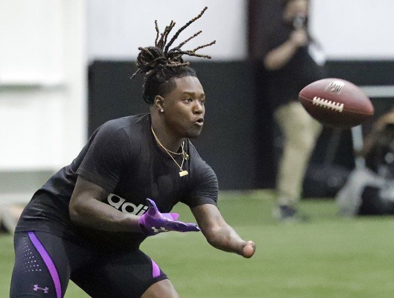 Central Florida’s Shaquem Griffin catches a pass during a drill at UCF’s Pro Day, Thursday, March 29, 2018, in Orlando, Fla. Pro day is intended to showcase talent to NFL scouts for the upcoming draft. (AP Photo/John Raoux)