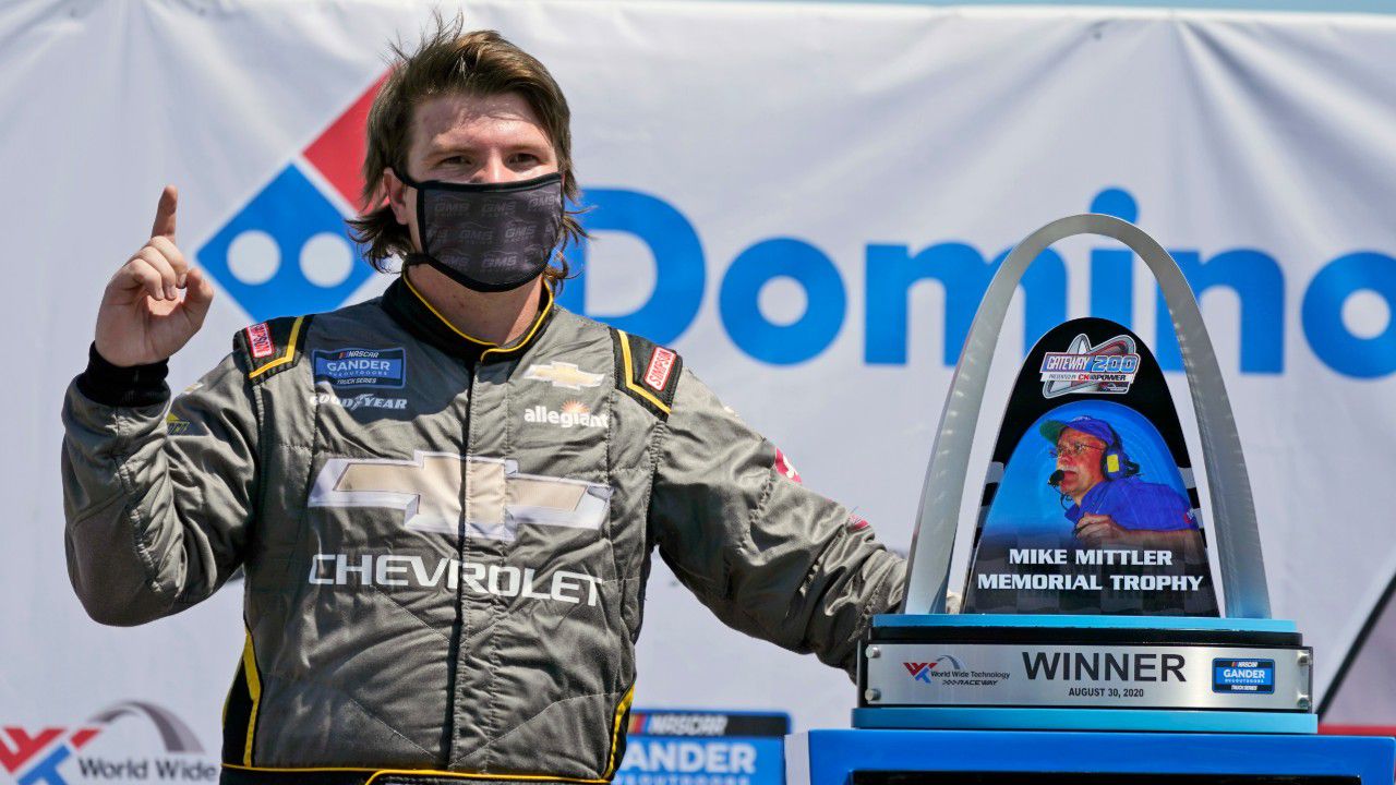 Sheldon Creed celebrates after winning a NASCAR Truck Series race at World Wide Technology Raceway on Sunday, Aug. 30, 2020, in Madison, Ill. (AP Photo/Jeff Roberson)