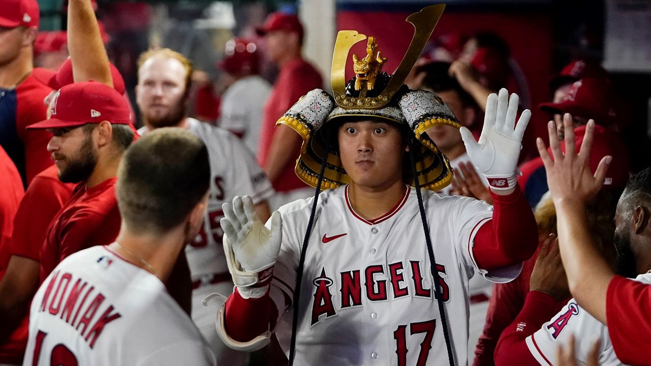 Shohei Ohtani hits 40th homer after leaving mound early with cramps in  Seattle's 5-3 win over Angels - ABC News
