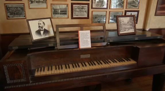 Antique piano returns to its former home on Staten Island