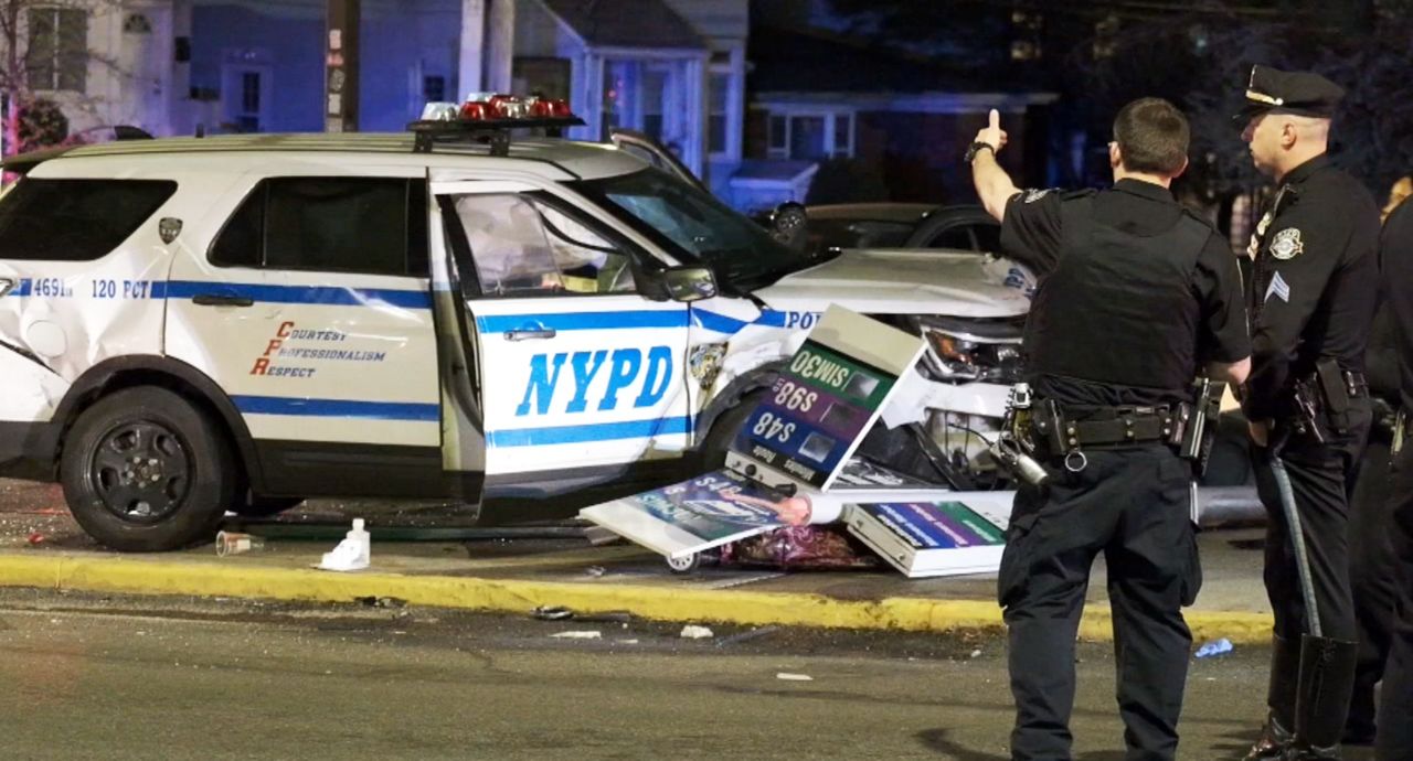 Woman struck by NYPD vehicle during multi-car crash