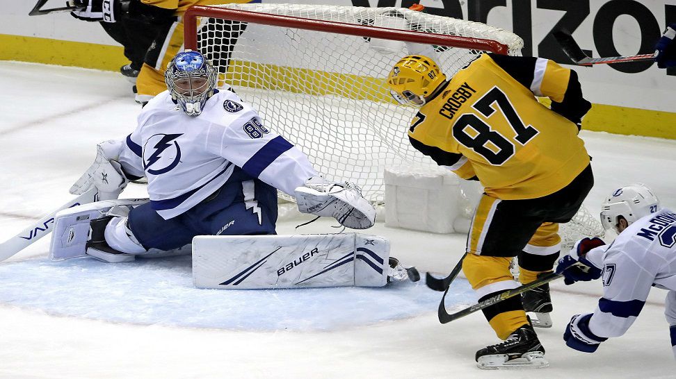 Pittsburgh Penguins' Sidney Crosby (87) puts the puck past Tampa Bay Lightning goaltender Andrei Vasilevskiy (88) for a goal in the first period of an NHL hockey game in Pittsburgh, Wednesday, Jan. 30, 2019. (AP Photo/Gene J. Puskar)