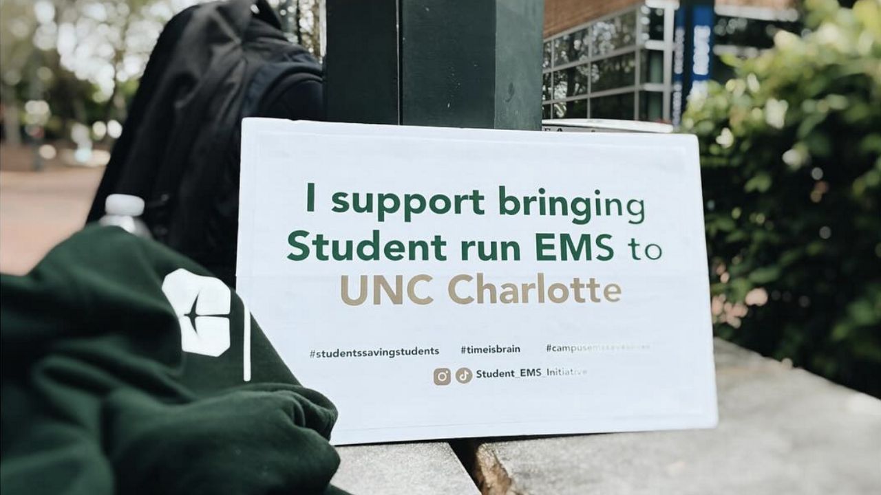 Sign supporting the initiative for a new student-run EMS program on UNC Charlotte's campus. (Instagram)