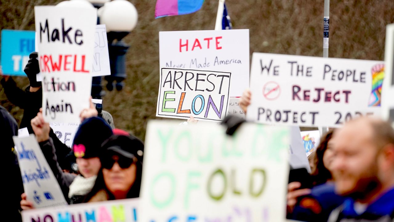 Hundreds gather in Frankfort to protest Trump