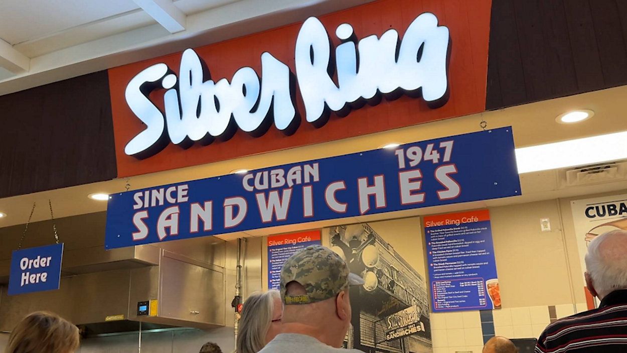 The iconic sign of the Silver Ring hangs next to several other eateries inside the Westshore Plaza food court. (Spectrum News/Nick Popham)