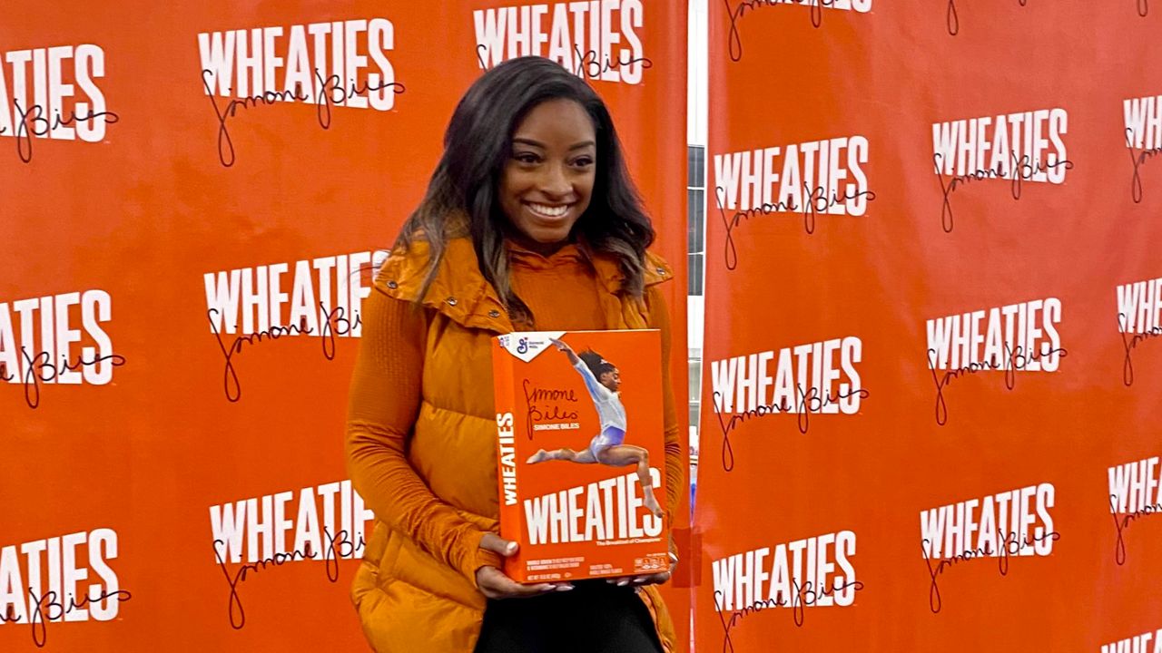 Simone Biles with her second Wheaties box. (Friends of the Children)