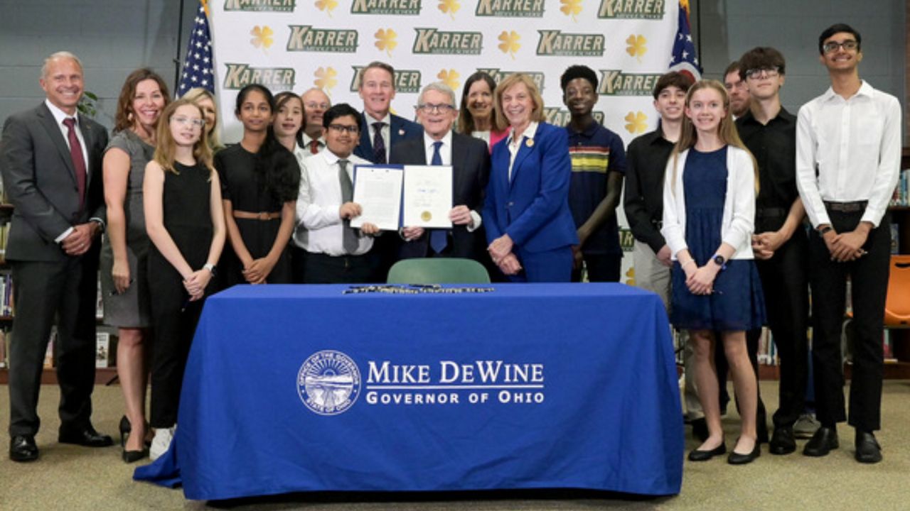 Governor DeWine signs House Bill 250 at Karrer Middle School in Dublin, Ohio.