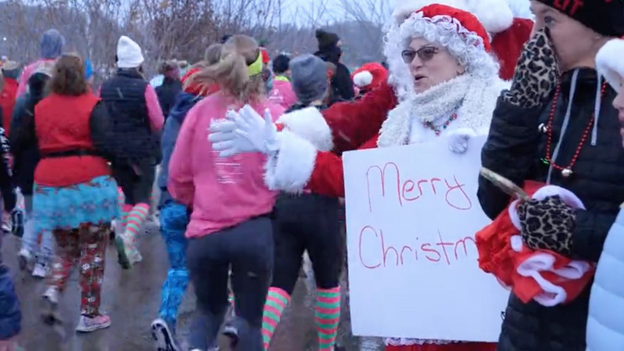 Hundreds braved the weather in Akron Saturday for the 12th annual Selfless Elf 5K. 