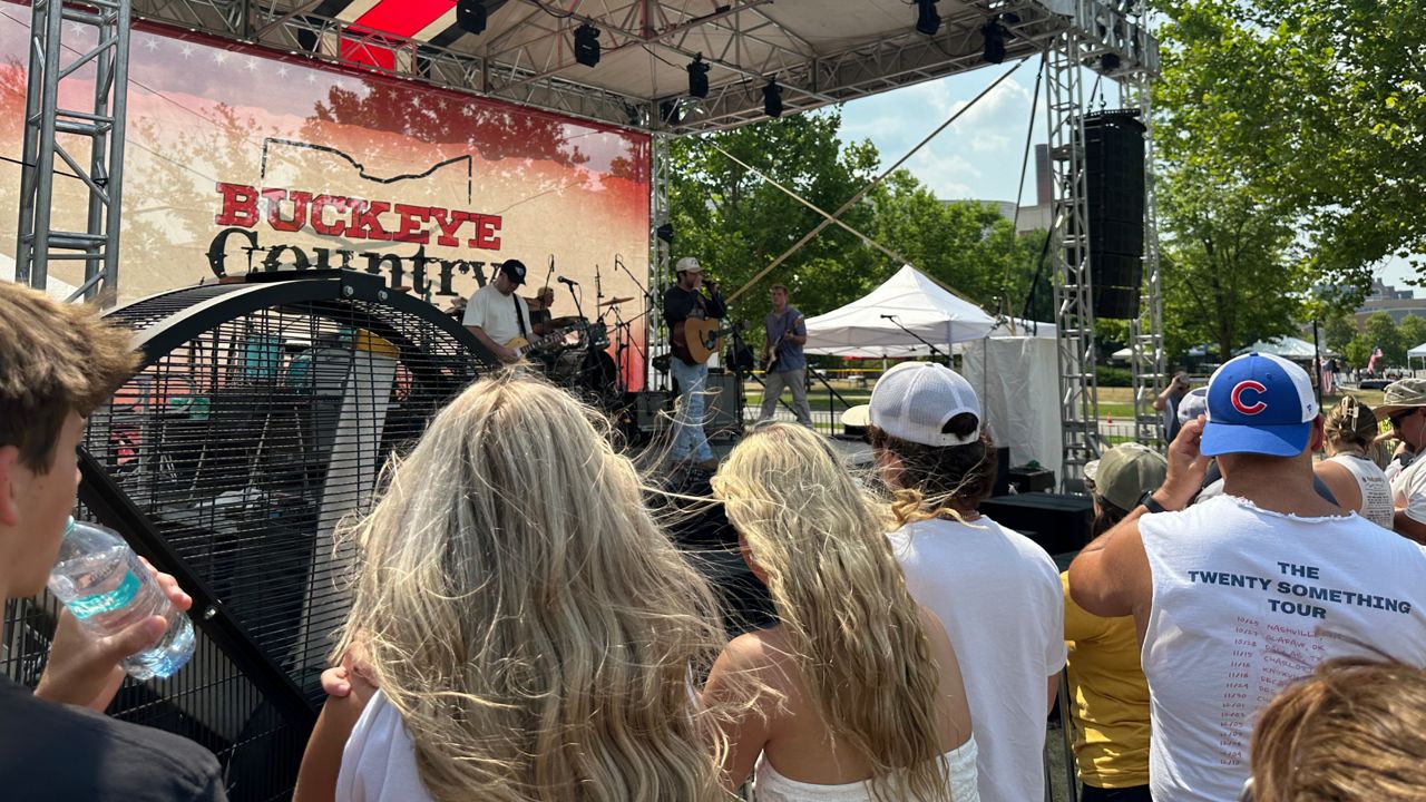 Attendees gather for the Fan Fest at the Buckeye Country Superfest Saturday, June 22. 