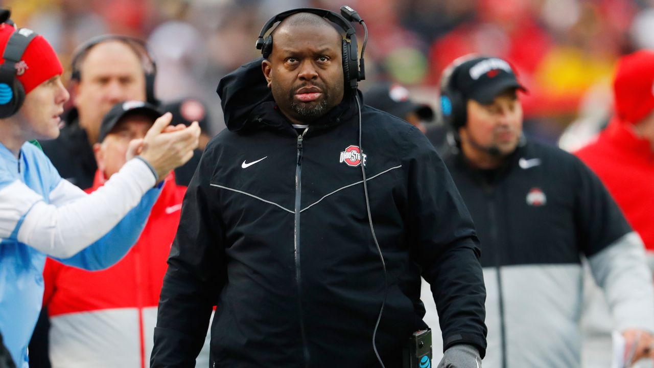 Tony Alford, Assistant Head Coach for Offense, Running Backs, watches against Michigan in the second half of an NCAA college football game in Ann Arbor, Mich., Nov. 30, 2019.