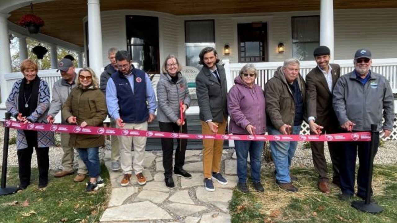 A ribbon cutting at the historic Lonz Mansion at Middle Bass Island State Park. 