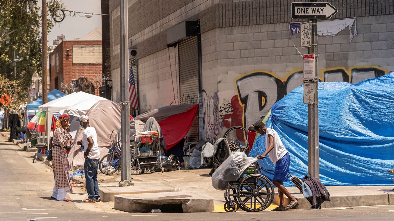 Tents line the streets of Skid Row area of Los Angeles on July 22, 2022. (AP Photo/Damian Dovarganes, File)