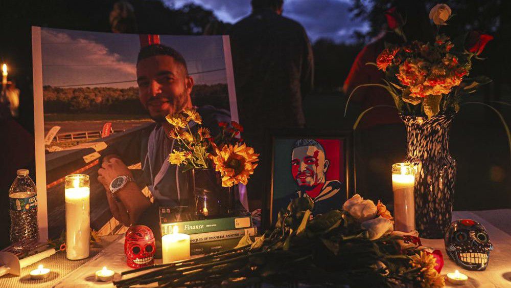 A Mexican-style ofrenda is set up at a vigil for Adil Dgoughi in Martindale, Texas on Oct. 24, 2021. (Aaron E. Martinez/Austin American-Statesman via AP)