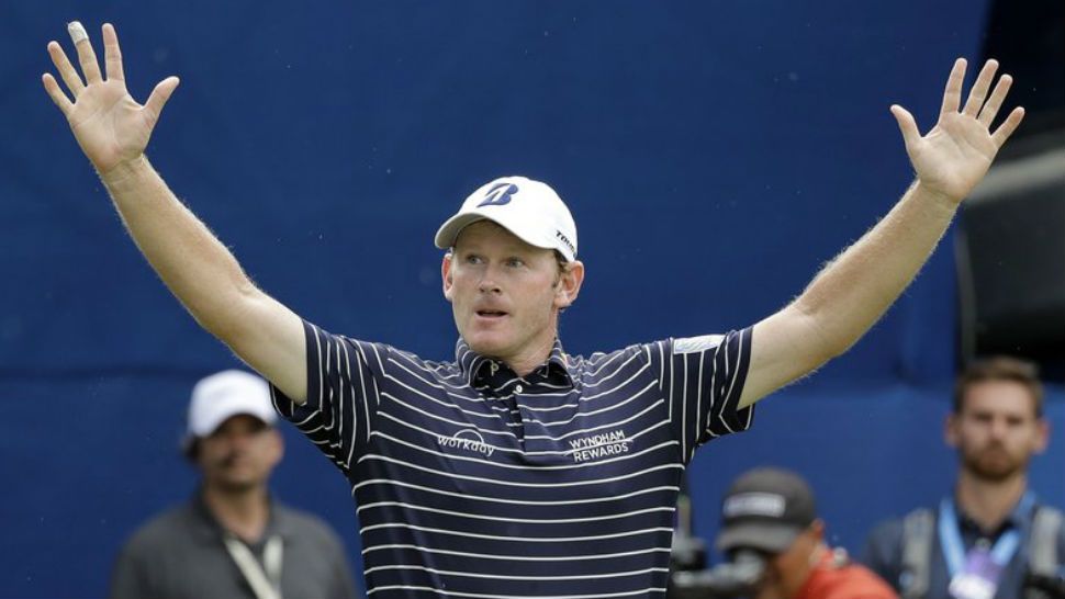 Brandt Snedeker reacts after winning the Wyndham Championship golf tournament at Sedgefield Country Club in Greensboro, N.C., Sunday, Aug. 19, 2018. (AP Photo/Chuck Burton)
