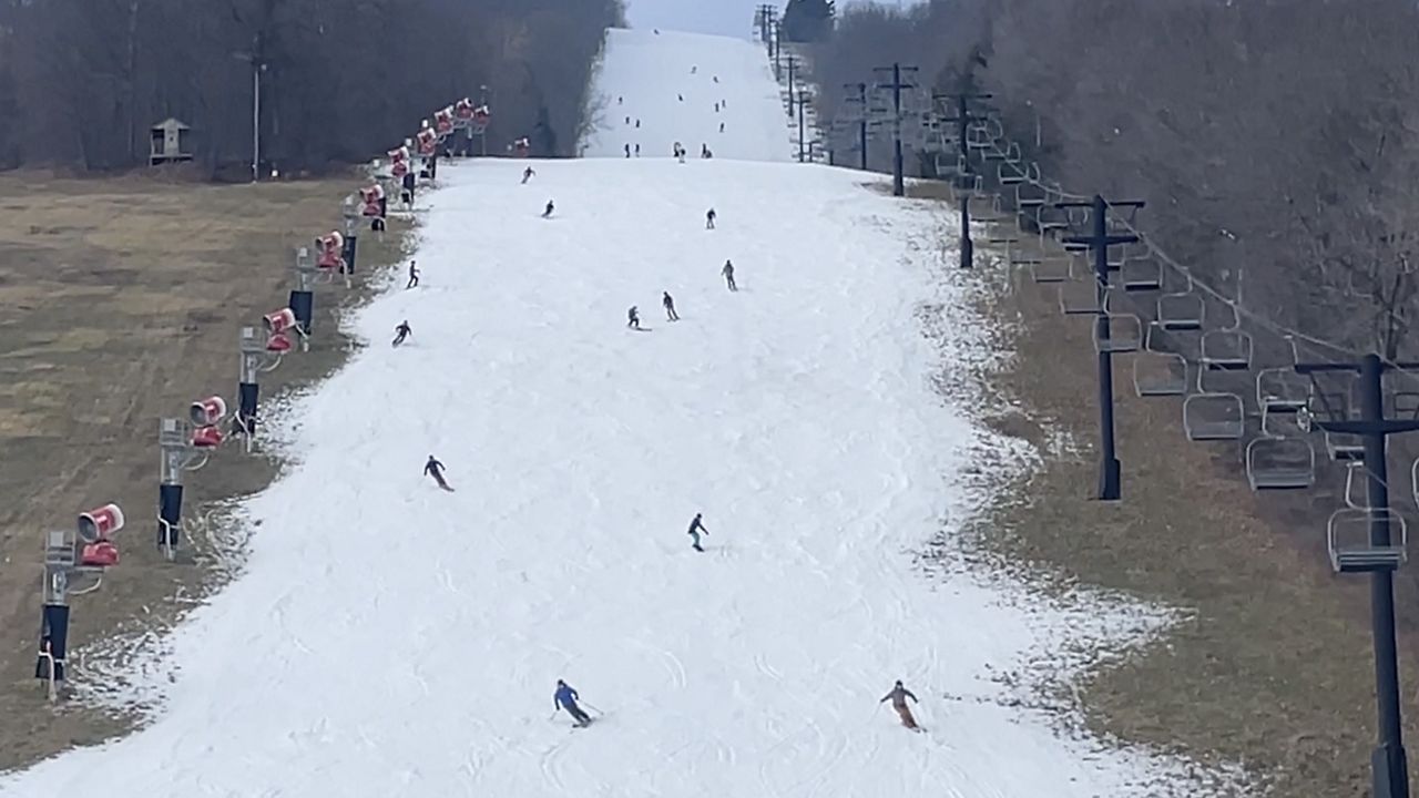 Lack of natural snow this winter not stopping ski season